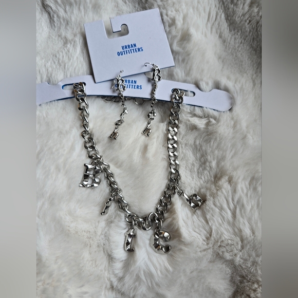 Urban Outfitters Jewelry - NWT! Urban Outfitters, Bad Girl SET (Necklace & Earrings), silver, MSRP $50